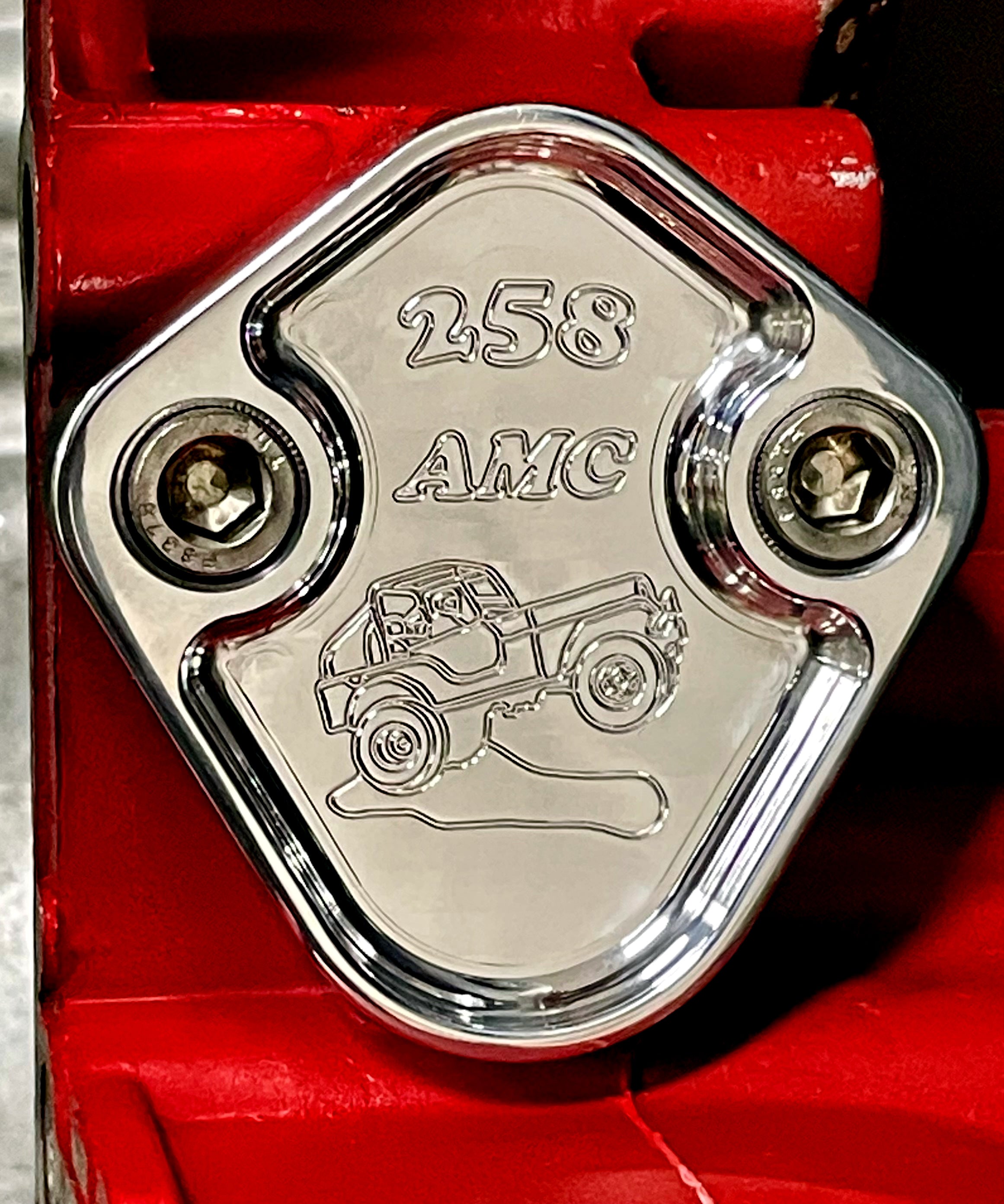 F109 diamond style fuel pump block off plate installed on red timing cover showing precise fit domestic engines USA-made aluminum