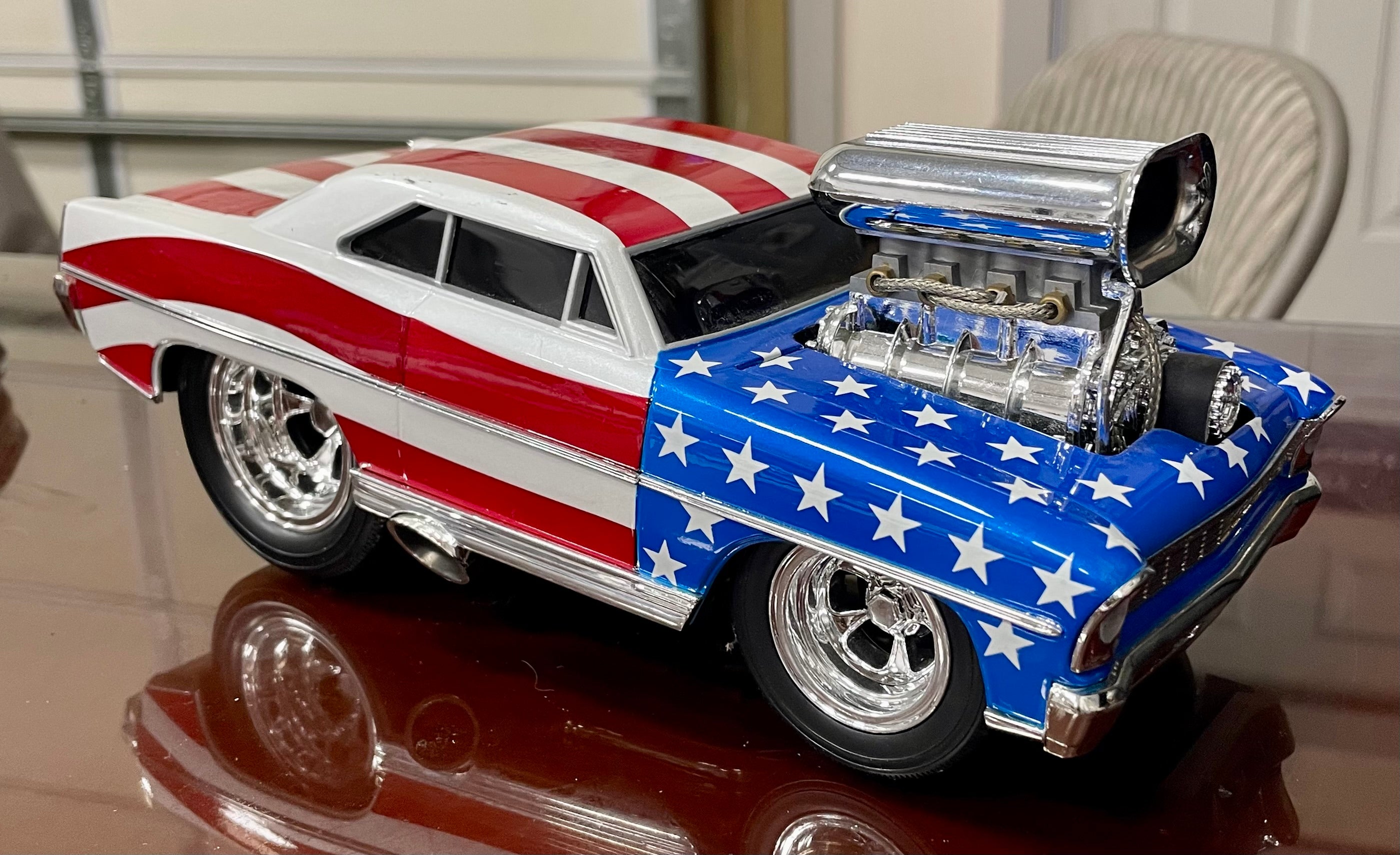 1966 Chevy Nova Muscle Machines Stars & Stripes  1:18 Scale Diecast Car - Collectible